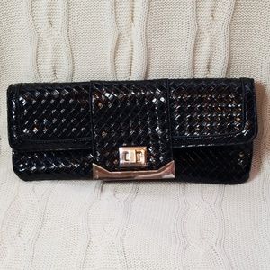 Black woven leather clutch